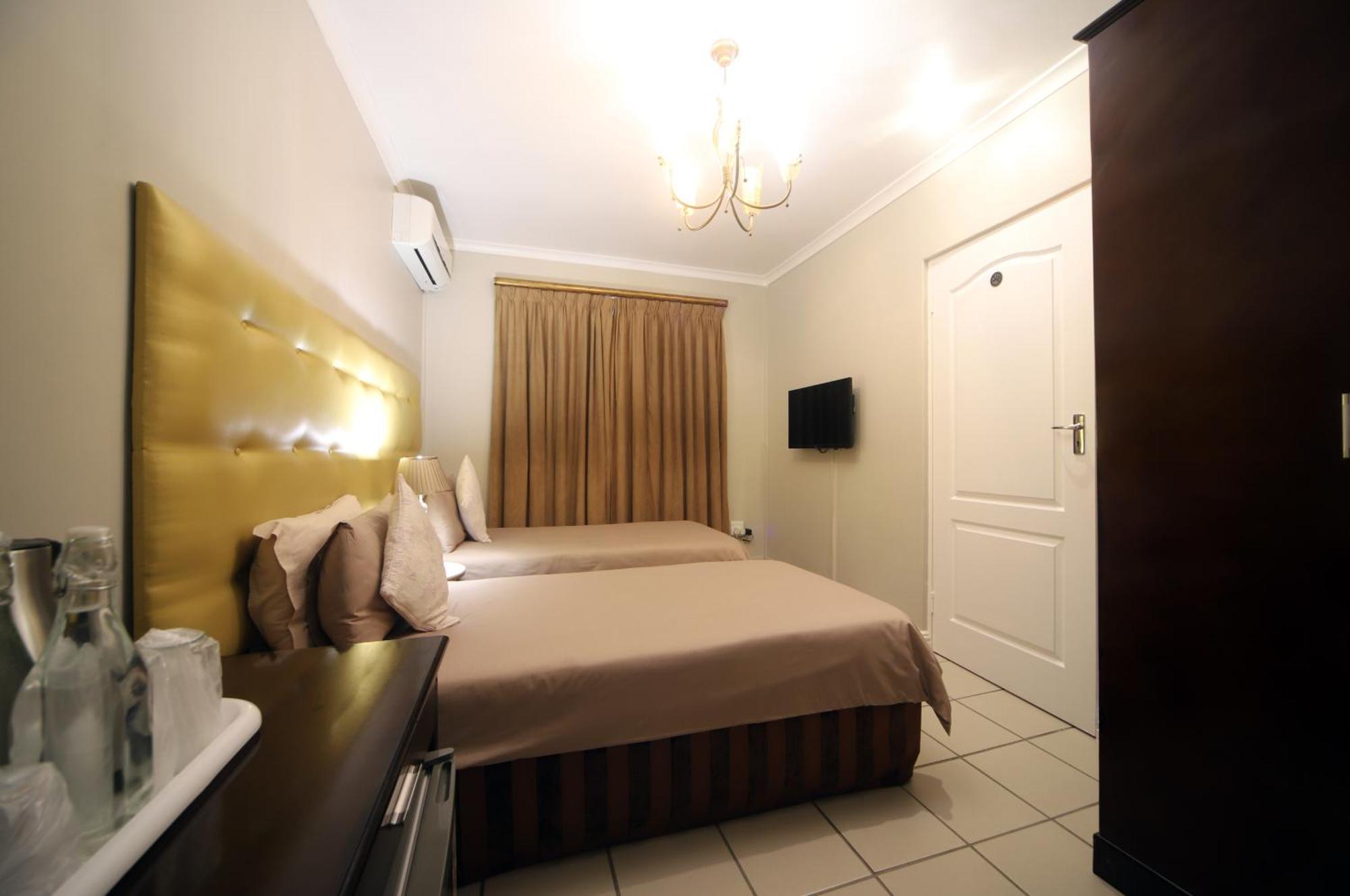 Savoy Lodge Кейптаун Номер фото